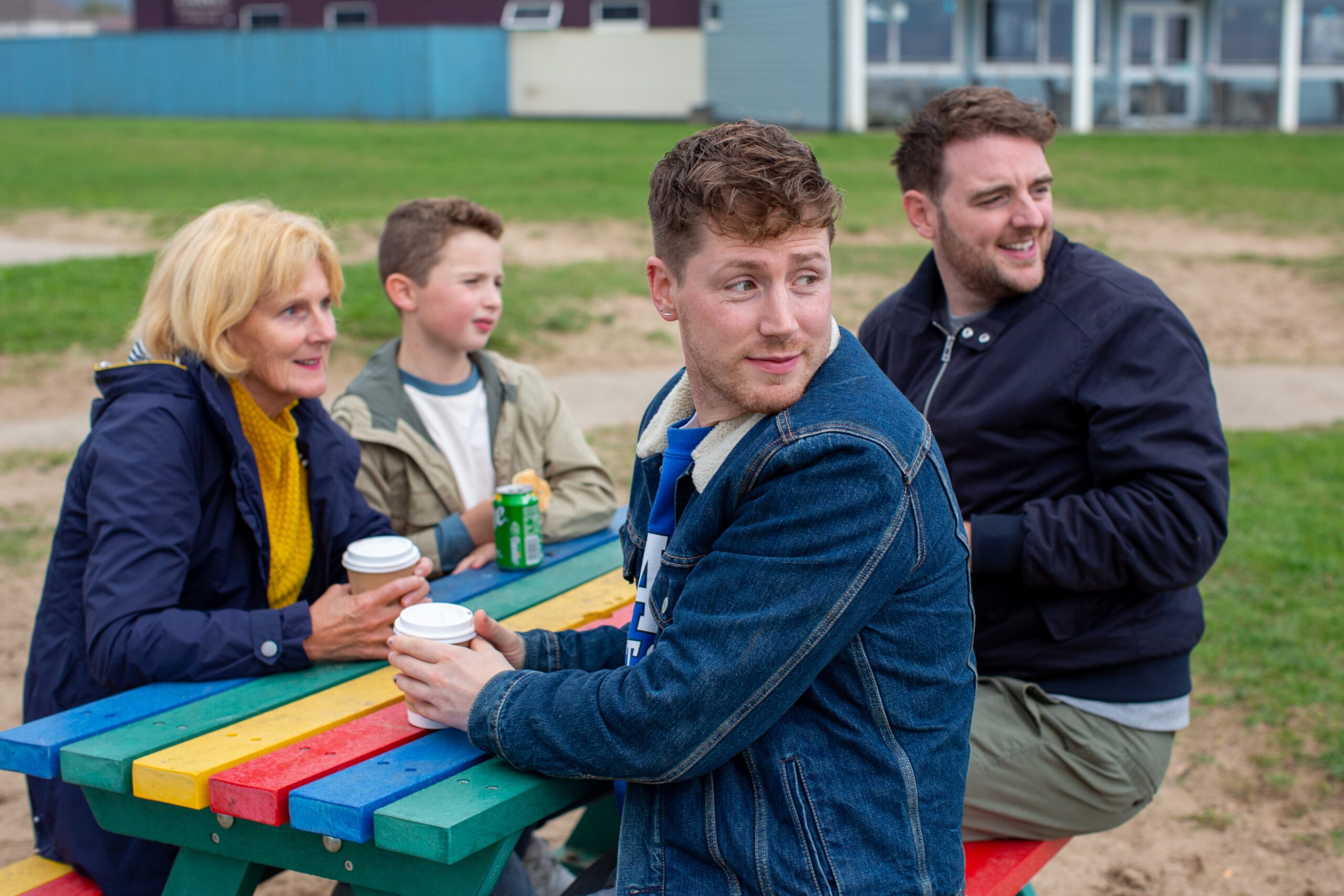Family sitting at a picnic table